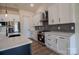 This kitchen boasts stainless steel appliances, modern cabinetry, and stone countertops at 1429 Coppergate Dr, Salisbury, NC 28147