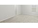 Neutral bedroom featuring plush carpet, window and closet with ample space at 14328 Evening Flight Ln, Charlotte, NC 28262
