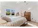 Cozy bedroom with large windows, wood floors, and ample natural light at 14827 Smith Rd, Charlotte, NC 28273