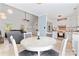 Cozy dining area adjacent to the kitchen with ample seating and natural light at 14827 Smith Rd, Charlotte, NC 28273