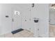 Welcoming entryway featuring neutral walls and tiled floors with a potted plant at 14827 Smith Rd, Charlotte, NC 28273