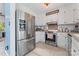 Well-equipped kitchen with stainless steel appliances and white cabinetry at 14827 Smith Rd, Charlotte, NC 28273