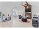 Bright living room featuring a brick fireplace, modern furnishings, and an open layout at 14827 Smith Rd, Charlotte, NC 28273