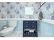 Stylish powder room featuring floral wallpaper, a modern vanity, and a sleek toilet, creating a chic design at 14911 Barnsbury Dr, Huntersville, NC 28078