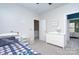Spacious bedroom with neutral carpet and decor, a ceiling fan, and lots of natural light at 14911 Barnsbury Dr, Huntersville, NC 28078