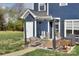 Outdoor patio featuring cushioned wicker furniture and a pergola creating a relaxing and inviting backyard living space at 14911 Barnsbury Dr, Huntersville, NC 28078