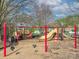 A vibrant playground with slides, swings, and climbing structures providing an ideal recreation area at 14911 Barnsbury Dr, Huntersville, NC 28078