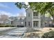 Community pool area with lounge chairs and stone-accented building, perfect for relaxation and enjoying sunny days at 14911 Barnsbury Dr, Huntersville, NC 28078