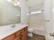 Bathroom with a single vanity, mirror, and a shower-tub combo at 15506 Lakepoint Forest Dr, Charlotte, NC 28278