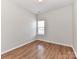 Bedroom with light hardwood flooring and natural light at 15506 Lakepoint Forest Dr, Charlotte, NC 28278