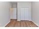 Bedroom with wood flooring and closet at 15506 Lakepoint Forest Dr, Charlotte, NC 28278