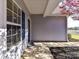 Covered entrance with side window and a walkway to the front door at 15506 Lakepoint Forest Dr, Charlotte, NC 28278