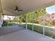 Enclosed screen porch, offering relaxing views of the landscaped backyard at 15506 Lakepoint Forest Dr, Charlotte, NC 28278