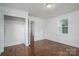 Bedroom features wood floors, walk-in closet and white trim throughout at 201 Lee Black Rd, Cherryville, NC 28021