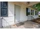 View of front door on covered front porch at 201 Lee Black Rd, Cherryville, NC 28021