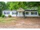 Cozy one-story home with black shutters and a covered porch at 201 Lee Black Rd, Cherryville, NC 28021