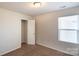 Bedroom features carpet and is freshly painted with attached closet at 2035 Talbert Ct, Charlotte, NC 28214