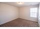 Bedroom features carpet and natural light at 2035 Talbert Ct, Charlotte, NC 28214