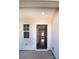 View through front door, showing light walls, dark wood floors and trim, and open floorplan at 2035 Talbert Ct, Charlotte, NC 28214