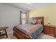 Comfortable bedroom with neutral walls, carpet, and light wood furniture in a cozy and well-lit space at 2319 Arbor Vista Dr, Charlotte, NC 28262