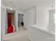 Bright hallway leading to rooms, showcasing the home's layout and access to various living spaces at 2319 Arbor Vista Dr, Charlotte, NC 28262