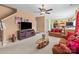 Spacious living room with a modern TV, fireplace, and an open layout connecting to the kitchen at 2319 Arbor Vista Dr, Charlotte, NC 28262