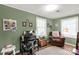 Cozy home office with natural light, wainscoting, and an inviting armchair creates a productive yet comfortable workspace at 260 Trexler Ln, Rock Hill, SC 29732