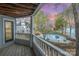 Balcony view of a serene community pool and lush landscaping at 329 Northwest Dr, Davidson, NC 28036