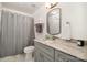 Bathroom featuring a vanity with granite countertop and shower with curtain at 336 Northwest Dr, Davidson, NC 28036