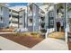 Attractive condo building with well-maintained landscaping at 336 Northwest Dr, Davidson, NC 28036