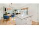 Open-concept kitchen featuring granite countertops, white cabinetry, and views of the living spaces at 336 Northwest Dr, Davidson, NC 28036