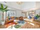 Inviting living room with hardwood floors, stylish furnishings, and seamless flow to the kitchen at 336 Northwest Dr, Davidson, NC 28036