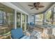 Inviting porch with comfortable seating and a ceiling fan at 336 Northwest Dr, Davidson, NC 28036