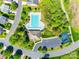 An aerial view showcases a community pool, playground, and ample parking at 3725 Catawba Creek Dr, Gastonia, NC 28056