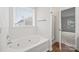 Bathroom featuring a soaking tub and a shower at 3725 Catawba Creek Dr, Gastonia, NC 28056