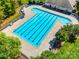 Aerial view of the community pool with trees and seating areas at 3725 Catawba Creek Dr, Gastonia, NC 28056