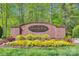 Community entrance sign with colorful flowers at Catawba Hills at 3725 Catawba Creek Dr, Gastonia, NC 28056