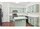 Charming kitchen featuring sage cabinets, stainless appliances, and white countertops at 3725 Catawba Creek Dr, Gastonia, NC 28056