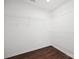 Spacious walk-in closet featuring wood floors and white wire shelving for optimal storage at 3725 Catawba Creek Dr, Gastonia, NC 28056