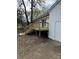 Elevated wooden deck accessible by stairs, provides a nice outdoor space at 3735 Stonehaven Dr, Charlotte, NC 28215