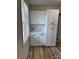 Close-up of white kitchen cabinets with marble backsplash and granite counters at 3735 Stonehaven Dr, Charlotte, NC 28215