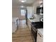Bright kitchen with stainless steel appliances and marble backsplash at 3735 Stonehaven Dr, Charlotte, NC 28215