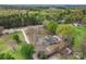 A lush landscape surrounds this beautiful property, offering a peaceful and private setting at 3987 Taxahaw Rd, Lancaster, SC 29720