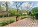 Large backyard features wooden deck area perfect for entertaining and relaxing at 3987 Taxahaw Rd, Lancaster, SC 29720