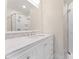 Elegant bathroom features a marble countertop vanity, a mirror, and a glass-enclosed shower at 3987 Taxahaw Rd, Lancaster, SC 29720