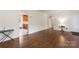 Spacious living room with hardwood floors and an open layout to the kitchen at 3987 Taxahaw Rd, Lancaster, SC 29720