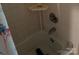 Small shower stall featuring white tiling at 4331 Knollcrest Dr, Charlotte, NC 28208