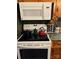 Kitchen with a white oven and microwave, and a tiled backsplash at 4331 Knollcrest Dr, Charlotte, NC 28208