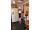 Kitchen with wood cabinets and updated refrigerator at 4331 Knollcrest Dr, Charlotte, NC 28208