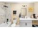 Renovated bathroom with marble tiling, modern fixtures, and a stylish vanity offers a luxurious experience at 504 Katherine Ave, Kings Mountain, NC 28086